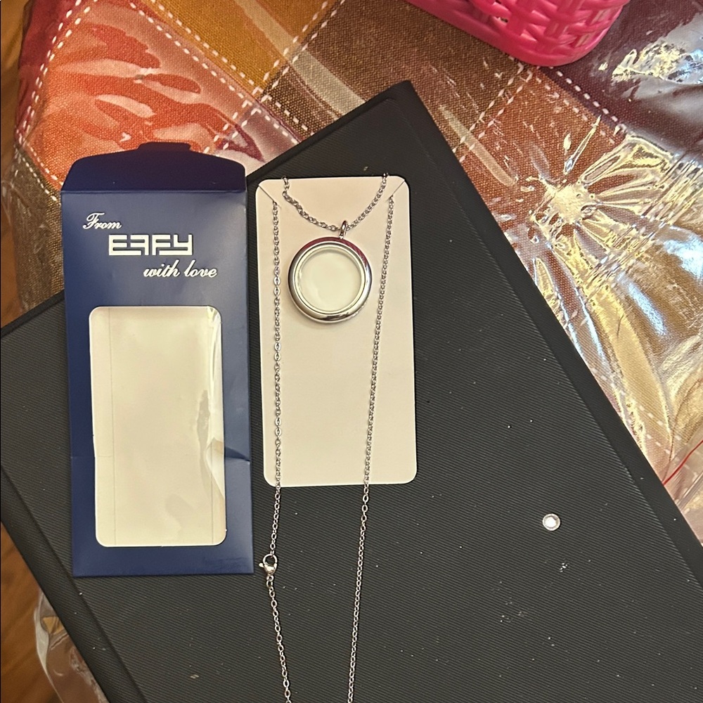 Silver Pendant Necklace. Effy brand. It opens up.